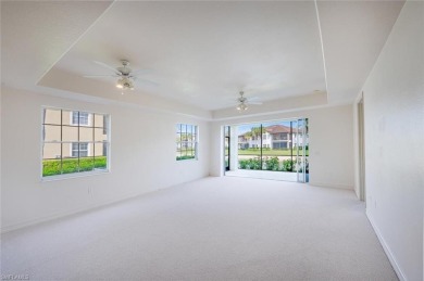 A Sought-after Berkeley model coach home with tranquil lake on Kensington Golf and Country Club in Florida - for sale on GolfHomes.com, golf home, golf lot