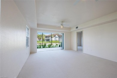 A Sought-after Berkeley model coach home with tranquil lake on Kensington Golf and Country Club in Florida - for sale on GolfHomes.com, golf home, golf lot