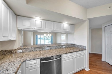 Here is your LOVELY LUXURY LAKEFRONT CORNER CONDO with beautiful on East Bay Golf Club in Florida - for sale on GolfHomes.com, golf home, golf lot