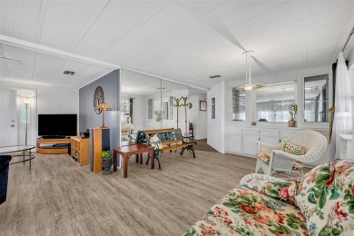 Not far from the busyness and excitement of Metro Orlando and on Zellwood Station Country Club in Florida - for sale on GolfHomes.com, golf home, golf lot