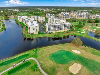 Here is your LOVELY LUXURY LAKEFRONT CORNER CONDO with beautiful on East Bay Golf Club in Florida - for sale on GolfHomes.com, golf home, golf lot