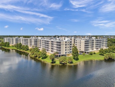 Here is your LOVELY LUXURY LAKEFRONT CORNER CONDO with beautiful on East Bay Golf Club in Florida - for sale on GolfHomes.com, golf home, golf lot