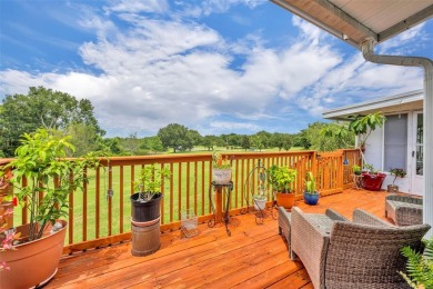 Not far from the busyness and excitement of Metro Orlando and on Zellwood Station Country Club in Florida - for sale on GolfHomes.com, golf home, golf lot