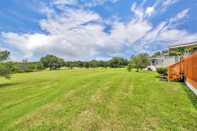 Not far from the busyness and excitement of Metro Orlando and on Zellwood Station Country Club in Florida - for sale on GolfHomes.com, golf home, golf lot