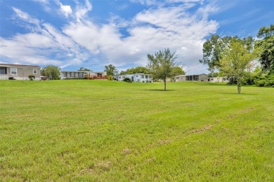 Not far from the busyness and excitement of Metro Orlando and on Zellwood Station Country Club in Florida - for sale on GolfHomes.com, golf home, golf lot