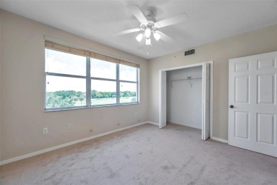 Here is your LOVELY LUXURY LAKEFRONT CORNER CONDO with beautiful on East Bay Golf Club in Florida - for sale on GolfHomes.com, golf home, golf lot