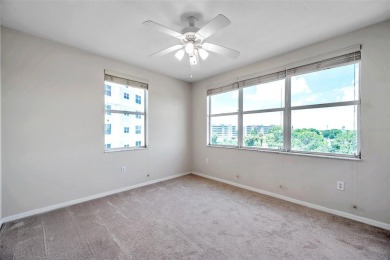 Here is your LOVELY LUXURY LAKEFRONT CORNER CONDO with beautiful on East Bay Golf Club in Florida - for sale on GolfHomes.com, golf home, golf lot