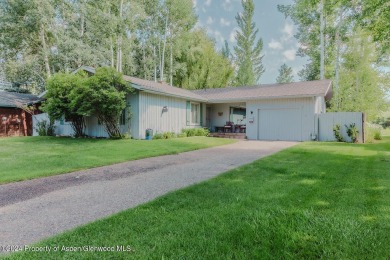 Discover the ease of single-floor living in this delightful on Ranch at Roaring Fork Golf Course in Colorado - for sale on GolfHomes.com, golf home, golf lot