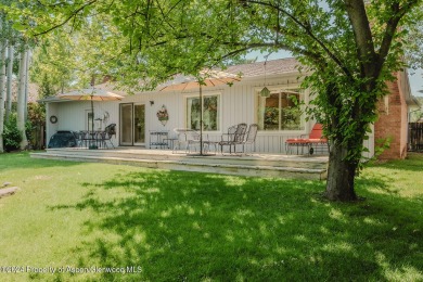 Discover the ease of single-floor living in this delightful on Ranch at Roaring Fork Golf Course in Colorado - for sale on GolfHomes.com, golf home, golf lot