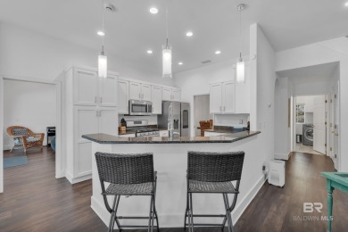 Experience the perfect blend of coastal and golf course living on The Golf Club of the Wharf in Alabama - for sale on GolfHomes.com, golf home, golf lot