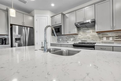 This 2021 TURNKEY Pulte *Summerwood* with a COURSE APPROVED golf on River Hall Country Club in Florida - for sale on GolfHomes.com, golf home, golf lot