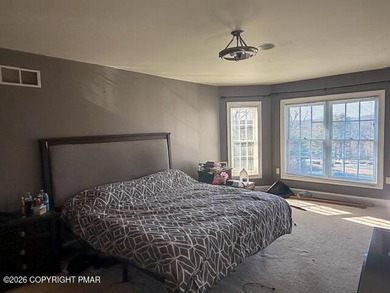 A Diamond in the Poconos Just Waiting to SHINE Tucked away in a on Country Club of the Poconos Golf Course in Pennsylvania - for sale on GolfHomes.com, golf home, golf lot