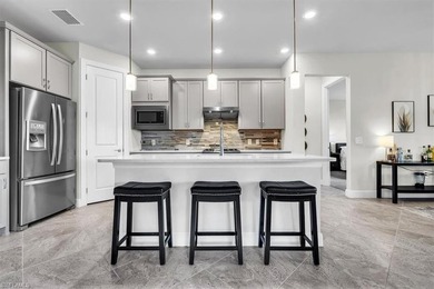 This 2021 TURNKEY Pulte *Summerwood* with a COURSE APPROVED golf on River Hall Country Club in Florida - for sale on GolfHomes.com, golf home, golf lot