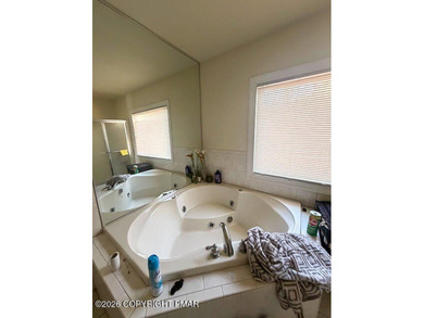 A Diamond in the Poconos Just Waiting to SHINE Tucked away in a on Country Club of the Poconos Golf Course in Pennsylvania - for sale on GolfHomes.com, golf home, golf lot