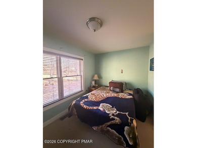 A Diamond in the Poconos Just Waiting to SHINE Tucked away in a on Country Club of the Poconos Golf Course in Pennsylvania - for sale on GolfHomes.com, golf home, golf lot