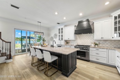 A magnificent WATERFRONT HOME in one of Florida's most coveted on Queens Harbour Yacht and Country Club in Florida - for sale on GolfHomes.com, golf home, golf lot