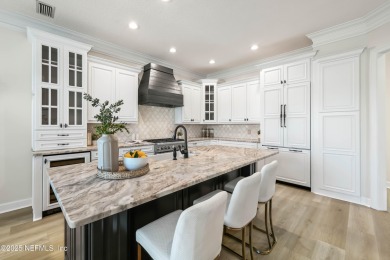 A magnificent WATERFRONT HOME in one of Florida's most coveted on Queens Harbour Yacht and Country Club in Florida - for sale on GolfHomes.com, golf home, golf lot