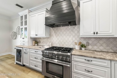 A magnificent WATERFRONT HOME in one of Florida's most coveted on Queens Harbour Yacht and Country Club in Florida - for sale on GolfHomes.com, golf home, golf lot