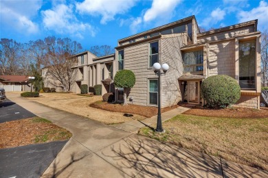 Experience lake life with unending water views, a covered slip on Stone Creek Cove Golf Course in South Carolina - for sale on GolfHomes.com, golf home, golf lot