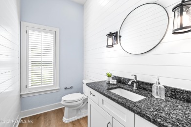 A magnificent WATERFRONT HOME in one of Florida's most coveted on Queens Harbour Yacht and Country Club in Florida - for sale on GolfHomes.com, golf home, golf lot