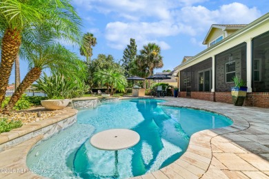 A magnificent WATERFRONT HOME in one of Florida's most coveted on Queens Harbour Yacht and Country Club in Florida - for sale on GolfHomes.com, golf home, golf lot