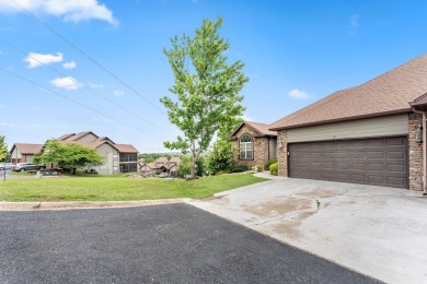 This stunning luxury patio home in the gated community of on Ledgestone Country Club and Golf Course in Missouri - for sale on GolfHomes.com, golf home, golf lot