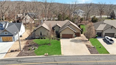 Hello Lake of the Ozarks! Step into this beautifully on Osage National Golf Club in Missouri - for sale on GolfHomes.com, golf home, golf lot