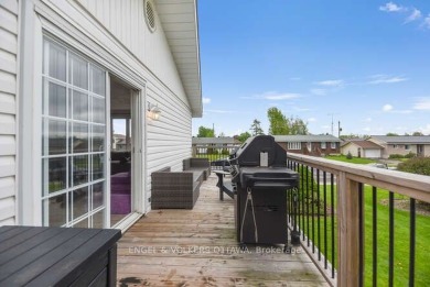 Charming side-split home on an oversized lot, ideally located on Dundas Valley Golf and Curling Club in  - for sale on GolfHomes.com, golf home, golf lot