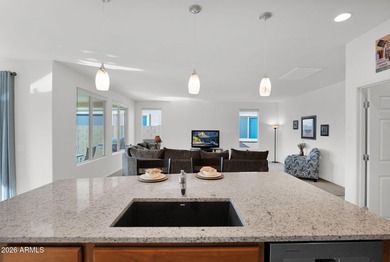 Welcome to this beautifully maintained newer built home, located on Poston Butte Golf Club in Arizona - for sale on GolfHomes.com, golf home, golf lot