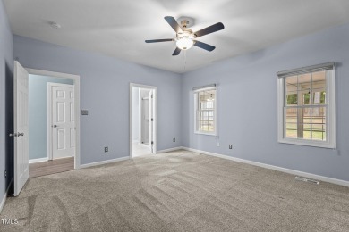 Welcome home to a beautifully maintained 3-bedroom home offering on River Golf and County Club at Lake Royale in North Carolina - for sale on GolfHomes.com, golf home, golf lot
