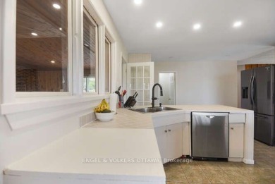 Charming side-split home on an oversized lot, ideally located on Dundas Valley Golf and Curling Club in  - for sale on GolfHomes.com, golf home, golf lot