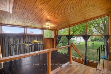 Charming side-split home on an oversized lot, ideally located on Dundas Valley Golf and Curling Club in  - for sale on GolfHomes.com, golf home, golf lot