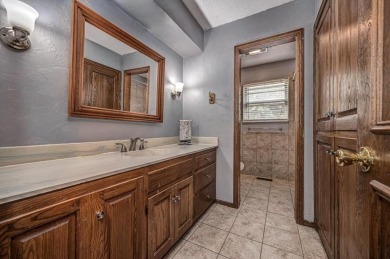 Large beautiful home overlooking the 11th tee of the Surrey on Golf Club At Surrey Hills in Oklahoma - for sale on GolfHomes.com, golf home, golf lot