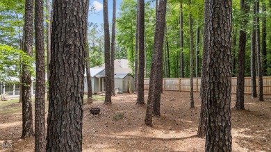 Welcome home to a beautifully maintained 3-bedroom home offering on River Golf and County Club at Lake Royale in North Carolina - for sale on GolfHomes.com, golf home, golf lot