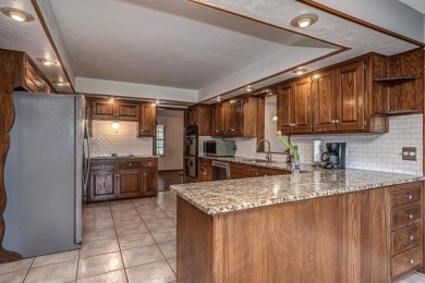 Large beautiful home overlooking the 11th tee of the Surrey on Golf Club At Surrey Hills in Oklahoma - for sale on GolfHomes.com, golf home, golf lot