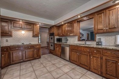 Large beautiful home overlooking the 11th tee of the Surrey on Golf Club At Surrey Hills in Oklahoma - for sale on GolfHomes.com, golf home, golf lot