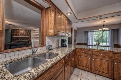Large beautiful home overlooking the 11th tee of the Surrey on Golf Club At Surrey Hills in Oklahoma - for sale on GolfHomes.com, golf home, golf lot