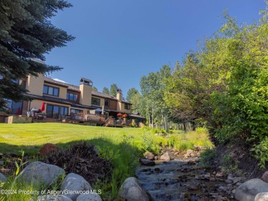 This Country Club Townhome enjoys privacy and a peaceful on The Snowmass Club in Colorado - for sale on GolfHomes.com, golf home, golf lot