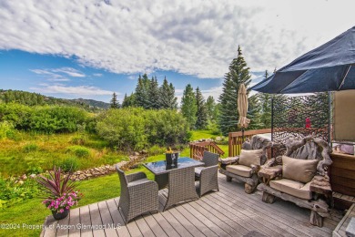 This Country Club Townhome enjoys privacy and a peaceful on The Snowmass Club in Colorado - for sale on GolfHomes.com, golf home, golf lot