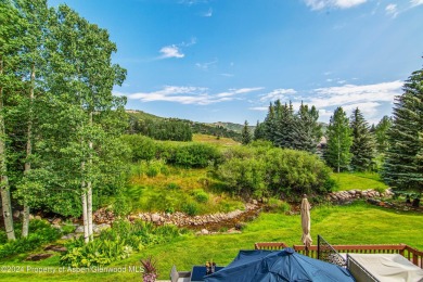 This Country Club Townhome enjoys privacy and a peaceful on The Snowmass Club in Colorado - for sale on GolfHomes.com, golf home, golf lot