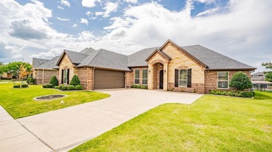 This lakefront home is located in the prestigious gated on Harbor Lakes Golf Club in Texas - for sale on GolfHomes.com, golf home, golf lot