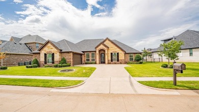 This lakefront home is located in the prestigious gated on Harbor Lakes Golf Club in Texas - for sale on GolfHomes.com, golf home, golf lot