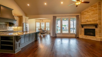 This lakefront home is located in the prestigious gated on Harbor Lakes Golf Club in Texas - for sale on GolfHomes.com, golf home, golf lot