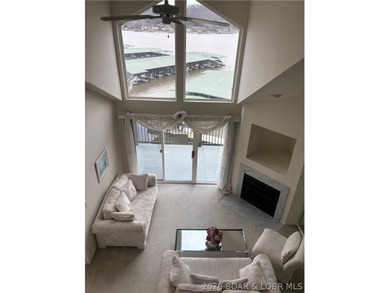 Discover this top-floor 3-bedroom, 3-bathroom condo with a on The Club At Old Kinderhook in Missouri - for sale on GolfHomes.com, golf home, golf lot