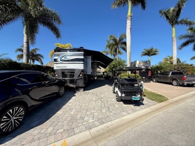 STUNNING NORTH-FACING PULL-IN LOT WITH WATER VIEWS! This lot is on Motorcoach Resort Golf Course in Florida - for sale on GolfHomes.com, golf home, golf lot