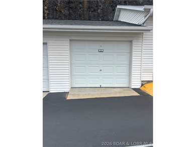 Discover this top-floor 3-bedroom, 3-bathroom condo with a on The Club At Old Kinderhook in Missouri - for sale on GolfHomes.com, golf home, golf lot