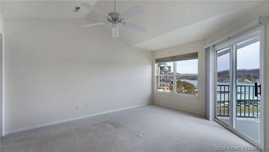 Discover this top-floor 3-bedroom, 3-bathroom condo with a on The Club At Old Kinderhook in Missouri - for sale on GolfHomes.com, golf home, golf lot