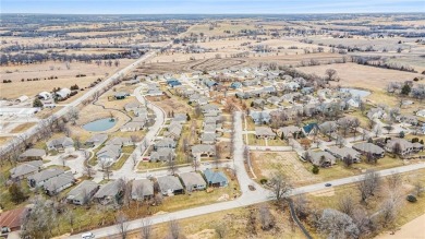 Meticulously maintained! Highly Desirable ROCKWOOD Community on Paola Country Club in Kansas - for sale on GolfHomes.com, golf home, golf lot