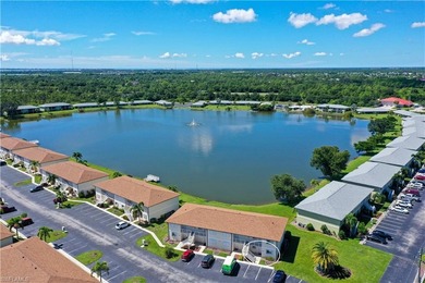 Gorgeous LAKE views and a short walk to the pool can be yours in on Kingsway Country Club in Florida - for sale on GolfHomes.com, golf home, golf lot
