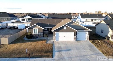 This well-maintained, move-in-ready home offers 6 bedrooms and 3 on Sage Lakes Municipal Golf Course in Idaho - for sale on GolfHomes.com, golf home, golf lot
